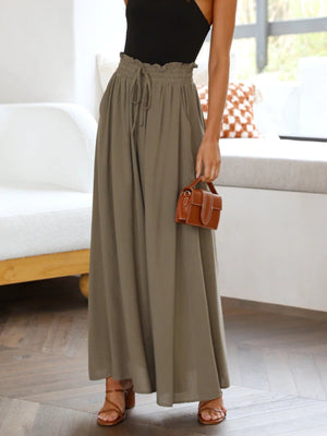 Textured drawstring palazzo trousers in Olive Brown with a ruffled paperbag waist and wide legs.
