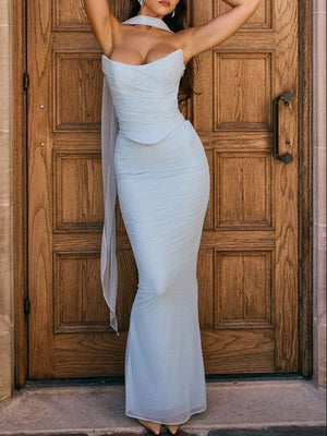 Sky blue sweetheart tube top and flowy maxi skirt set with sheer draped detail.