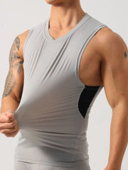 Gray performance tank top with black side panels and a V-neck.