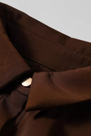 dark brown button-up shirt