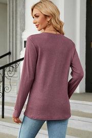 Waffle knit henley shirt in mauve with long sleeves and button placket detail.