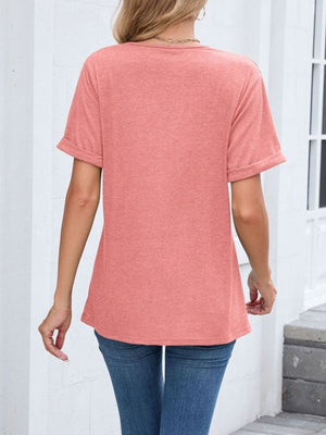 Pink v-neck t-shirt with cuffed short sleeves and a relaxed fit.