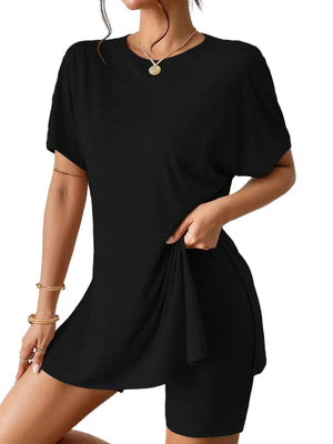 Black drape front tee and shorts set with side slit detail.
