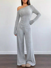 Light gray ribbed knit one-shoulder top and wide-leg pants set.