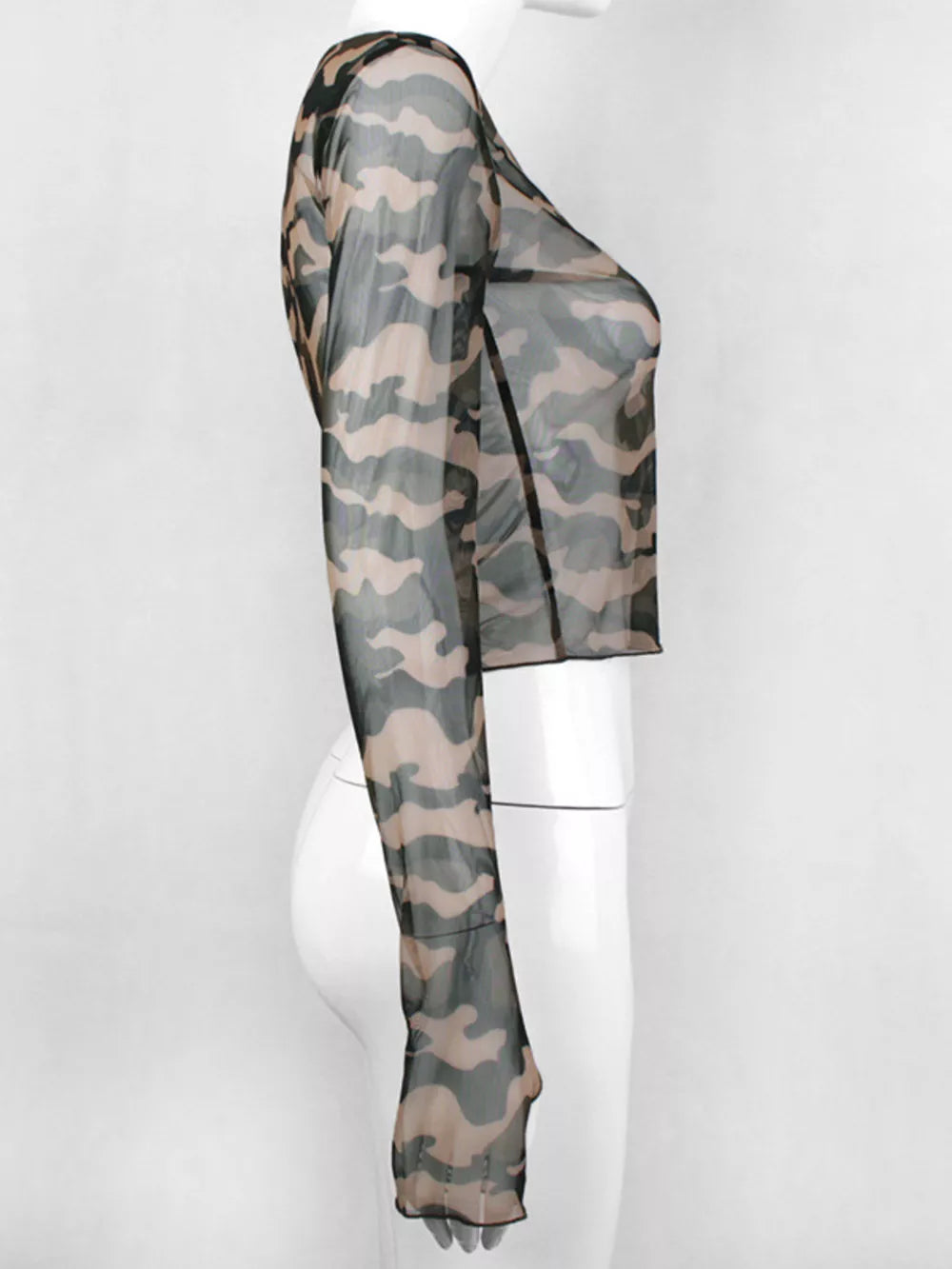 Sheer camouflage long sleeve cropped tee with a body-hugging fit.