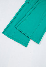 Turquoise cargo pocket lounge set pants detail with visible stitching and hem.