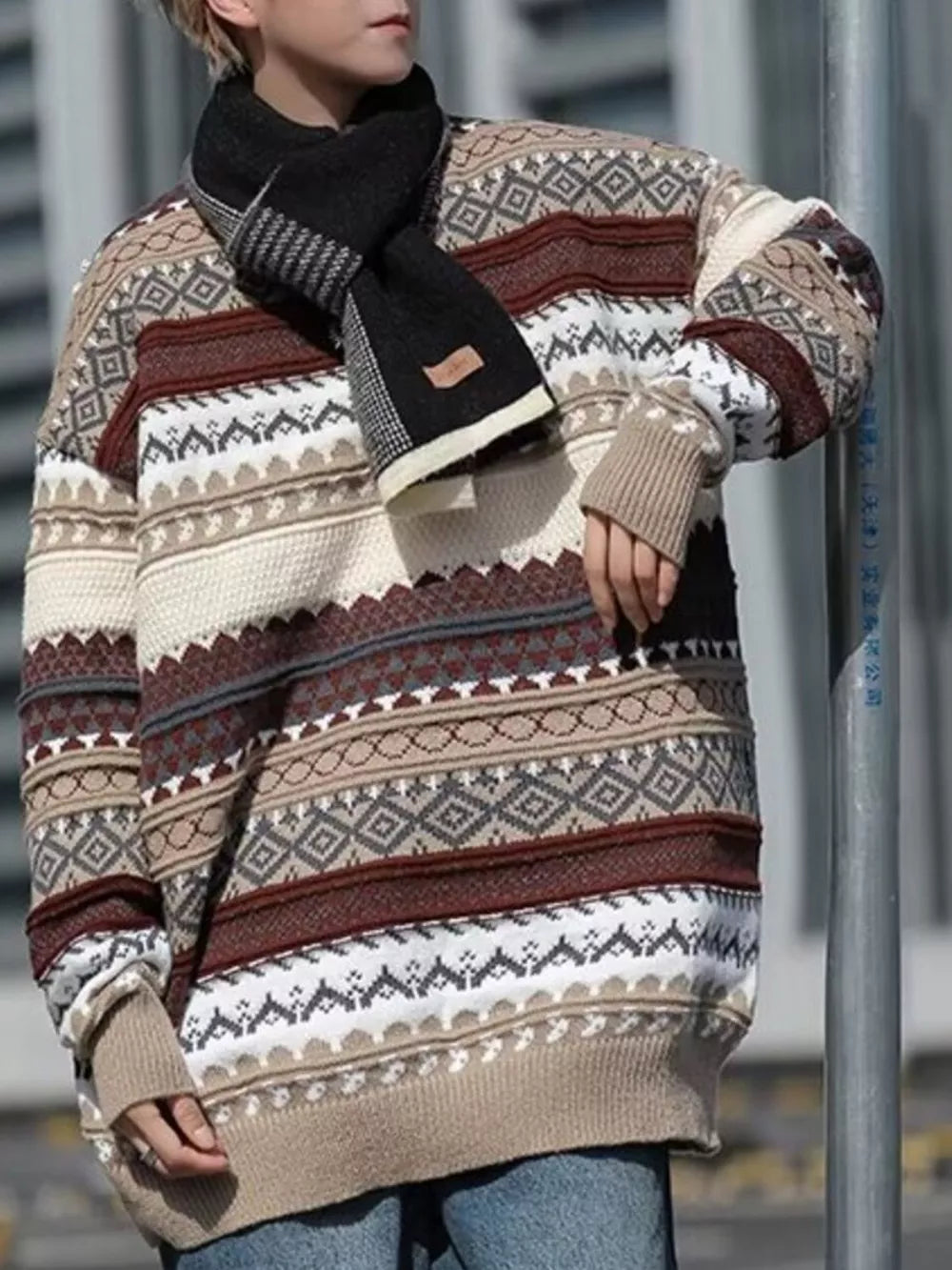 Gray and brown geometric knit sweater with a crew neck, long sleeves, and a heritage-inspired pattern.