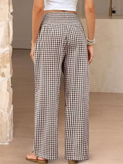 Black plaid gingham maternity pants with smocked waistband and wide legs.