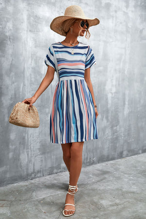 Striped yoke-seam trapeze dress with short sleeves and a flared skirt.
