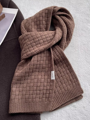 Luxurious dual knit wool scarf in taupe with basketweave pattern and ribbed trim.