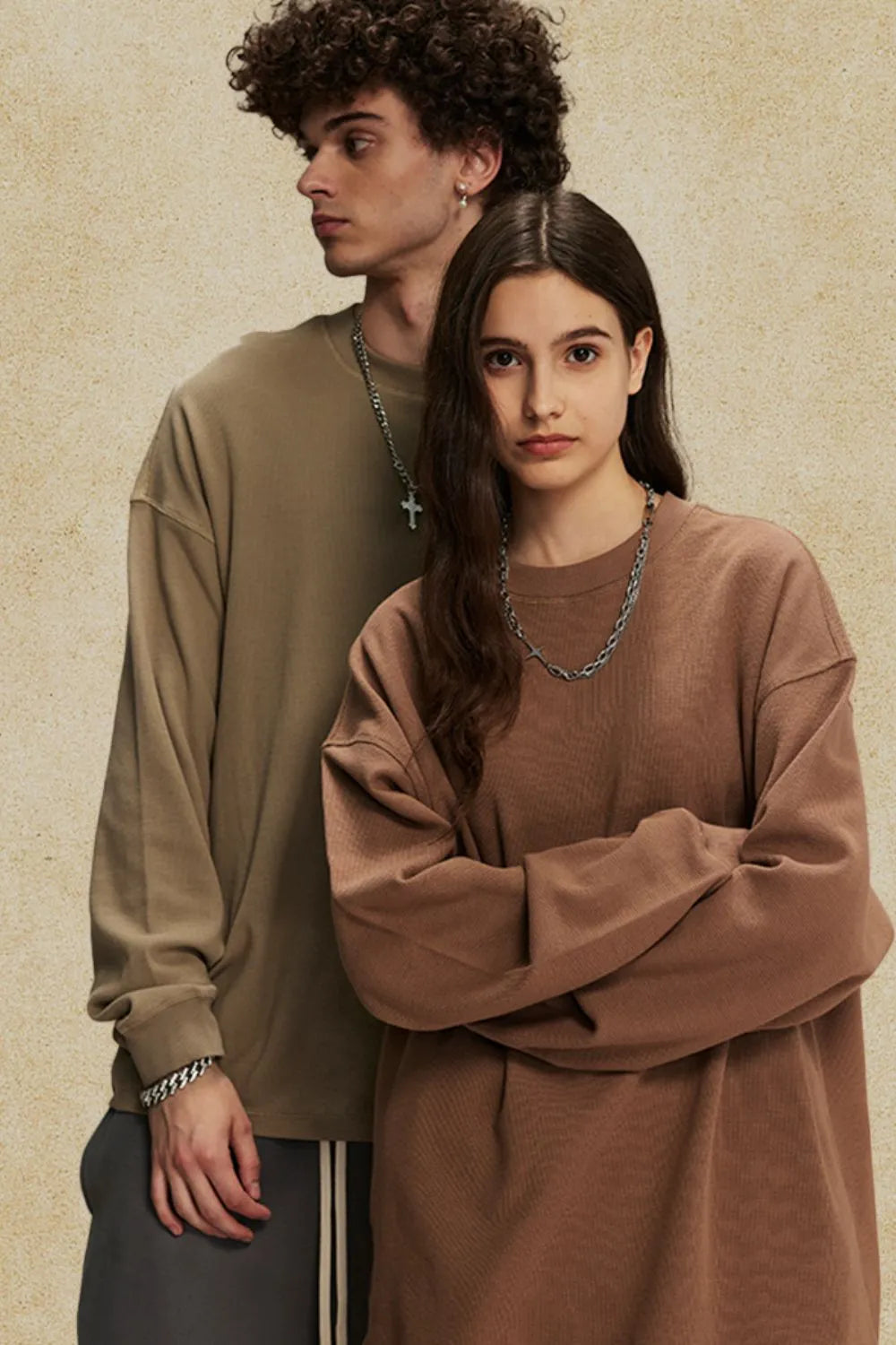 Oversized drop shoulder crewneck sweatshirt in brown, with relaxed fit and crew neckline.