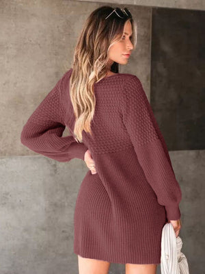 Burgundy knit mini dress with balloon sleeves and textured bodice.