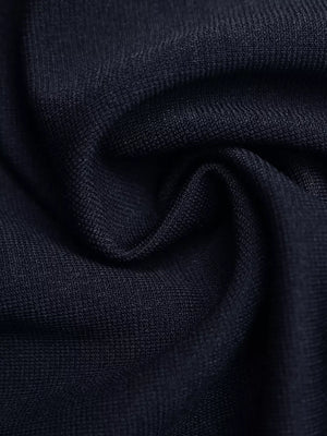 Navy knit vest fabric detail with subtle texture.