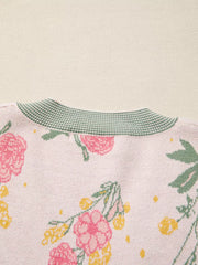 Floral v-neck knit sweater with pink flowers and green trim
