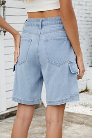 Medium wash denim utility shorts with cargo pockets and contrast stitching.