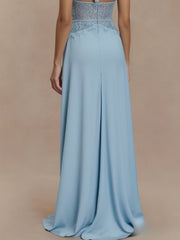 Sky blue lace trim halter neck maxi dress with a flowing skirt.