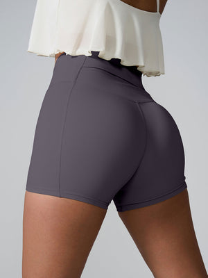 Charcoal active shorts with sculpted pocket detail and high waist