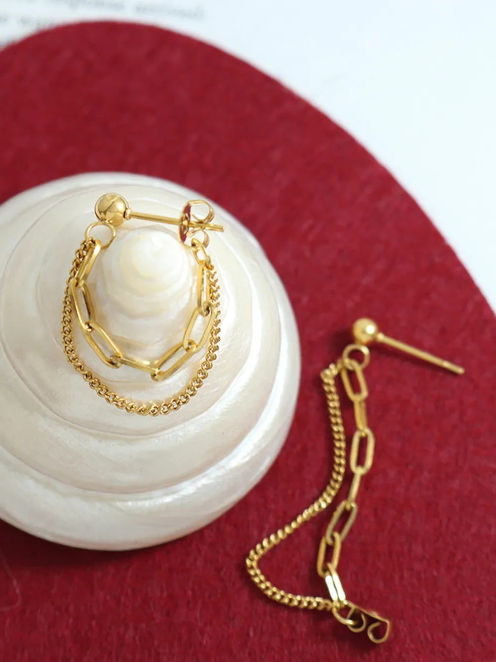 Gold interlocking chain drop earrings with double chain detail