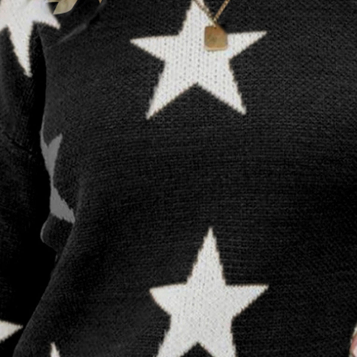 Black acrylic crewneck sweater with white star pattern