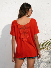 Red orange t-shirt with floral lace detail on the back