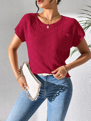 Burgundy knit pocket tee with textured check pattern and short sleeves.