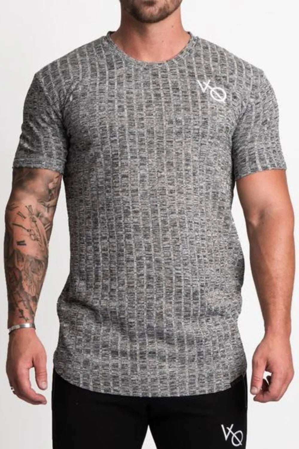Gray textured ribbed tee with short sleeves and a white logo detail on the chest.