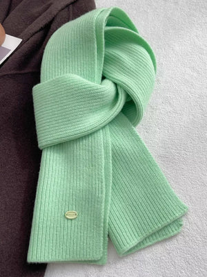 Light Green ribbed knit wool scarf with a small oval logo detail.