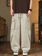 Men's Paris Gray drawstring cargo pants with button-down flap pockets and adjustable waist.