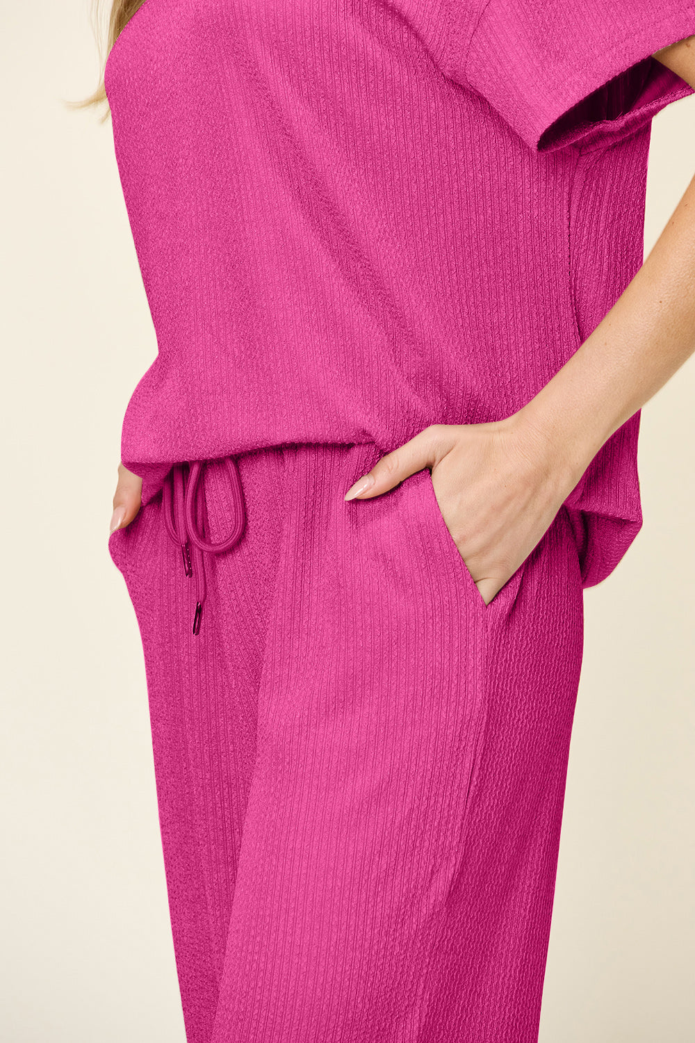 Hot Pink waffle knit loungewear set with drawstring waist and pockets.
