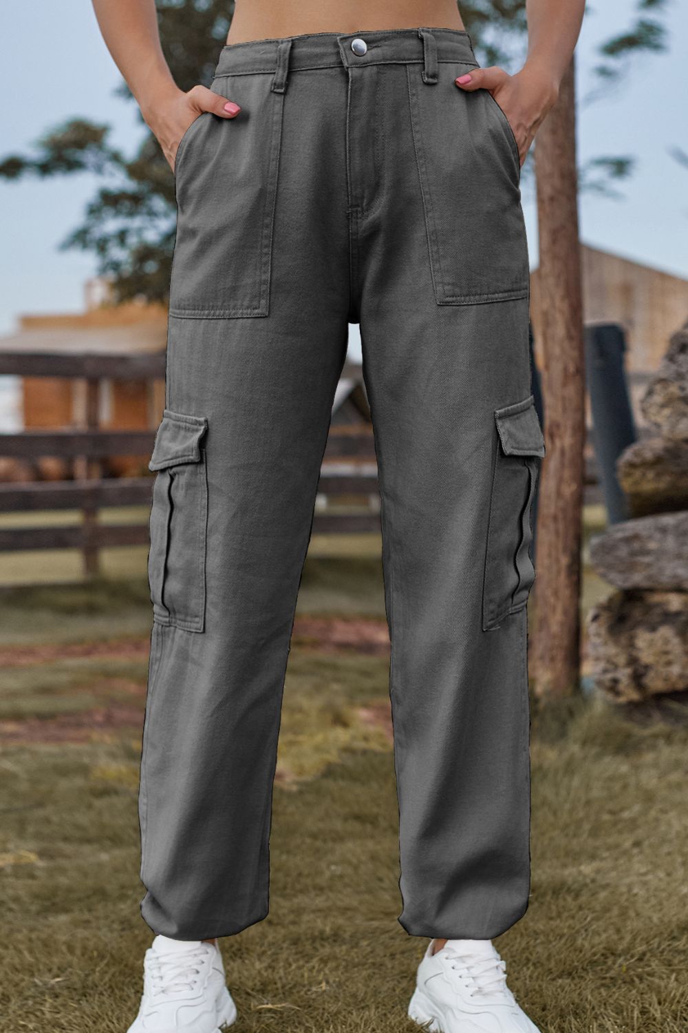 Dark gray cargo pants with multiple pockets and a relaxed fit.