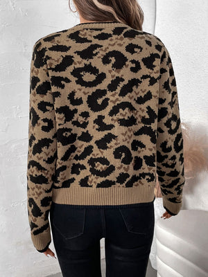 Tan leopard print acrylic knit cardigan with ribbed trim and cuffs.