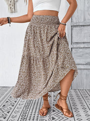 Tiered floral print midi skirt in mocha with smocked waist and airy fabric.