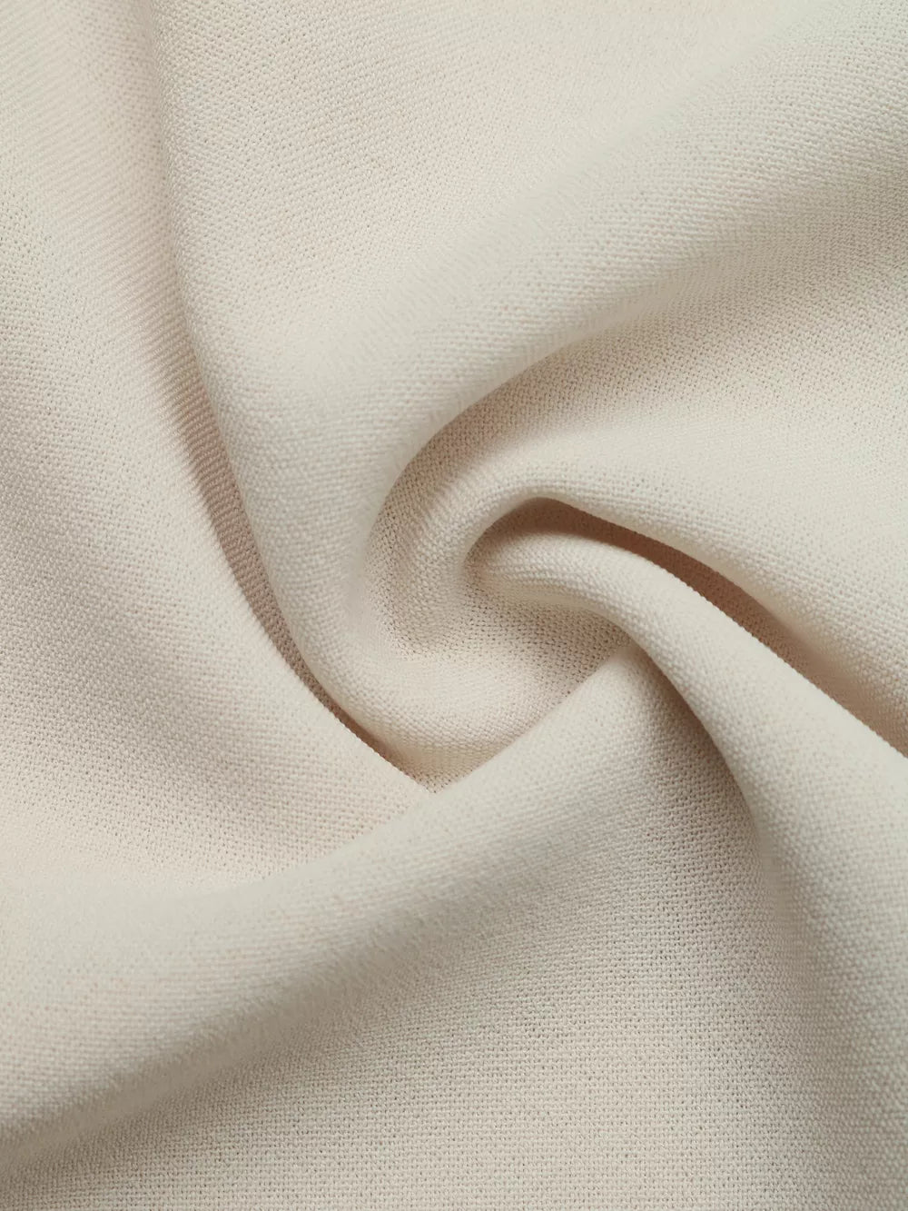 Beige tie-neck maternity overshirt fabric detail with subtle texture