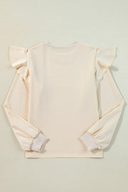 Cream ruffled shoulder sweatshirt with ribbed cuffs and crew neck.