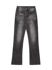 Men's black vintage high-waisted straight leg jeans with button closure and cotton blend fabric.
