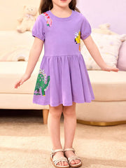 Purple cotton crew neck toddler dress with dinosaur print and flared skirt.