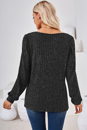 Puffed sleeve ribbed square neck top in black, shown from the back.