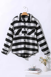 Textured checkerboard overshirt in plaid with button front and chest pockets.