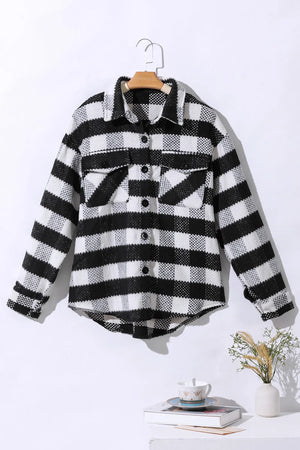 Textured checkerboard overshirt in plaid with button front and chest pockets.