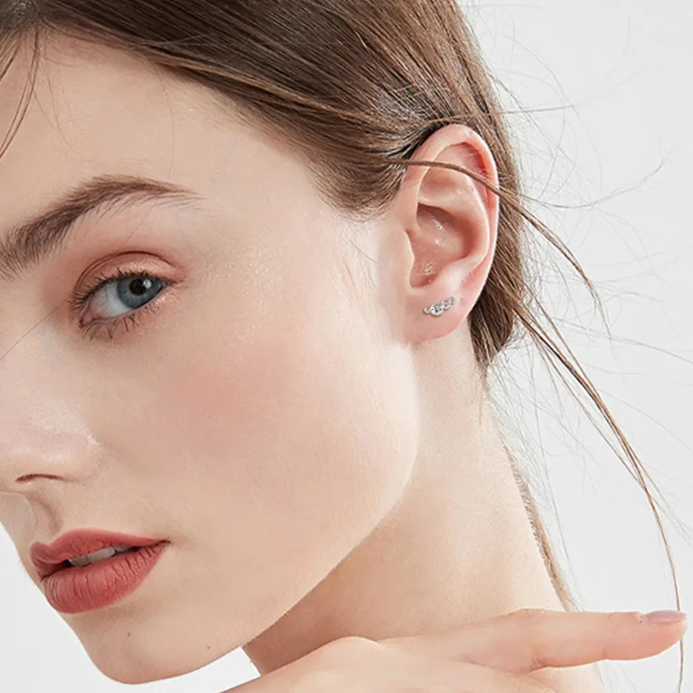Silver ear climbers with a celestial cluster design, perfect for daily wear.