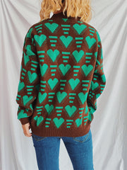 Brown acrylic knit jumper with neon green geometric heart pattern.