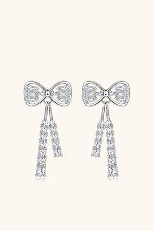 Silver bow drop earrings with baguette and round clear crystals