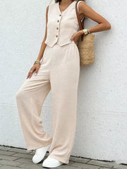 Chic beige button-down vest and flowing wide-leg pants set with textured fabric.