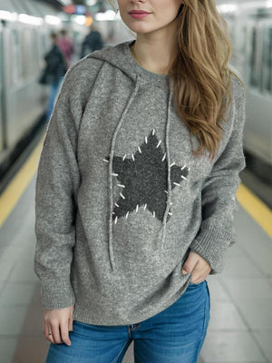 Gray knit hoodie with textured star appliqué and white contrast stitching.