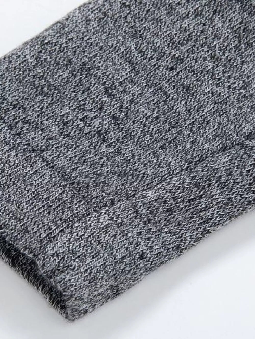 Gray heathered longline cardigan with pockets, textured knit detail.