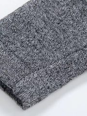 Gray heathered longline cardigan with pockets, textured knit detail.