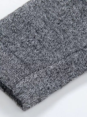 Gray heathered longline cardigan with pockets, textured knit detail.