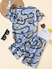 Light blue construction vehicle print toddler pajama set with short sleeves and shorts.