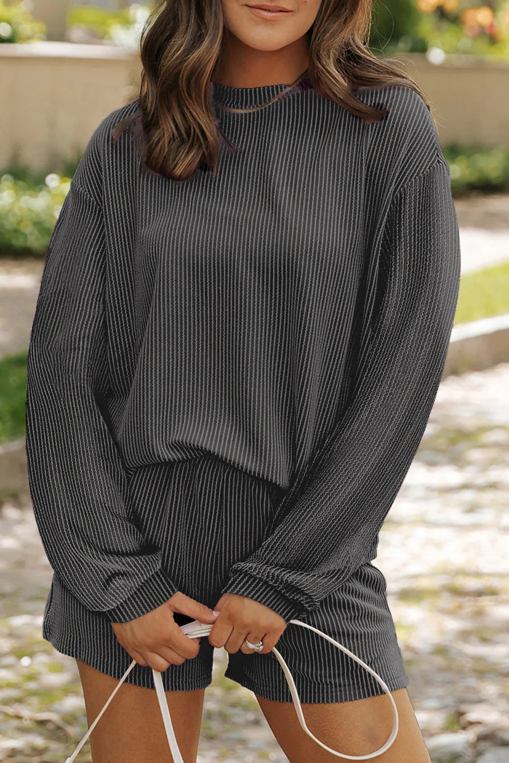 Black ribbed knit matching set with crew neck long sleeve top and shorts