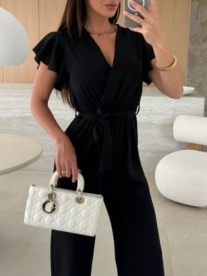 Surplice Ruffle Sleeve Wide Leg Jumpsuit in Black, model styling view